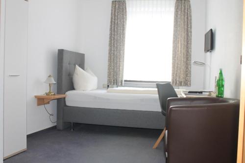 Katil atau katil-katil dalam bilik di Mittelrhein Pension