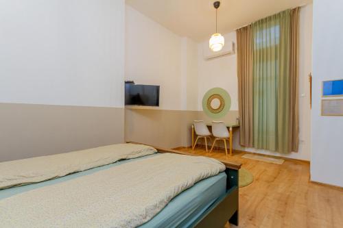 Posteľ alebo postele v izbe v ubytovaní RothApartments'GARDEN