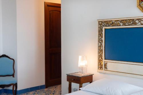 Ένα ή περισσότερα κρεβάτια σε δωμάτιο στο Villa Magnifico
