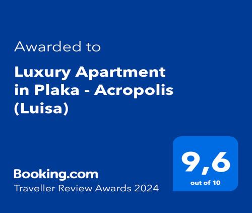 a screenshot of a phone with the text awarded to luxury apartment in plaza acropolis at Luxury Apartment in Plaka - Acropolis (Luisa) in Athens