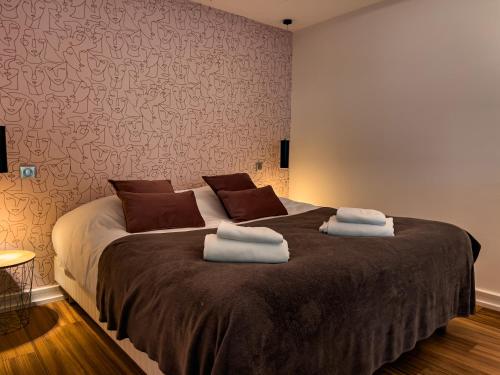 Katil atau katil-katil dalam bilik di La Maison Régent & spa - Plage de la Baule