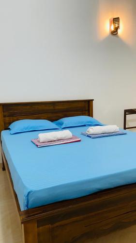 Cama o camas de una habitación en Elisha Place Hiriketiya