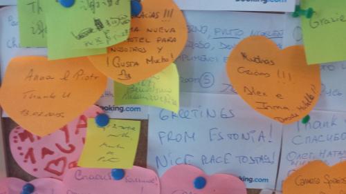 a wall of sticky notes with hearts on it at SelfMatic in Orio al Serio