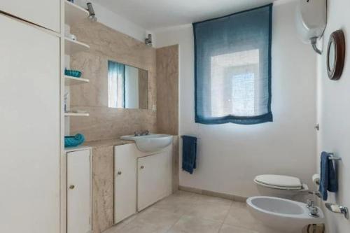 Et badeværelse på Villa Sea view on the rocks