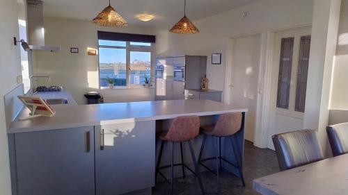 A kitchen or kitchenette at 8 person farmhouse with sauna