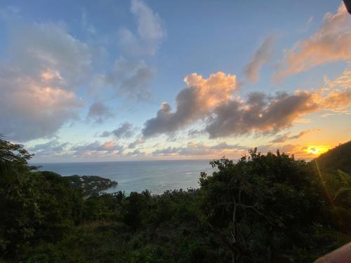 a view of the ocean at sunset at LE BLANC HIDEAWAY in Laborie