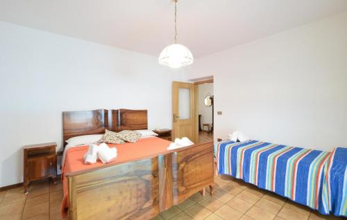 a bedroom with two beds in a room at Stunning Apartment In Bagolino, F Pcaffaro in Ponte Caffaro