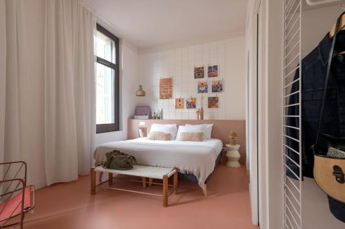 Postel nebo postele na pokoji v ubytování SLO Hostel Nice