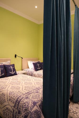 Ένα ή περισσότερα κρεβάτια σε δωμάτιο στο Kordon Apartment