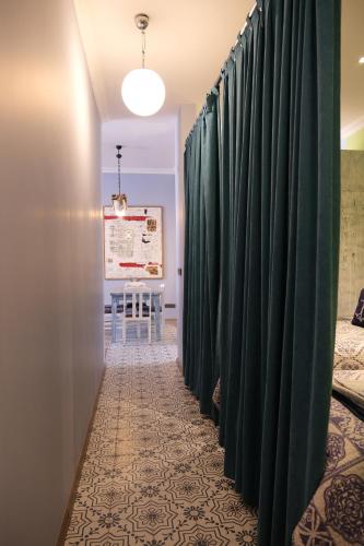 Ένα ή περισσότερα κρεβάτια σε δωμάτιο στο Kordon Apartment