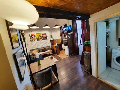 an overhead view of a living room and dining room at Authentic Belgrade Centre - Split level loft with patio in courtyard in Belgrade