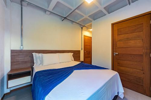 Katil atau katil-katil dalam bilik di Antiquus ApartHotel