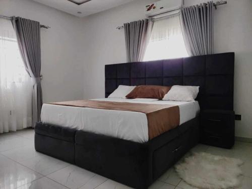 Voodi või voodid majutusasutuse Dapi Home Residence toas