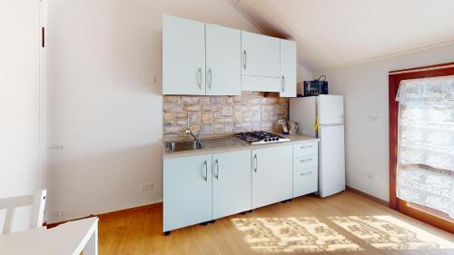 Køkken eller tekøkken på CliVio - By Ligooria