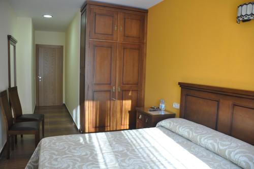 Katil atau katil-katil dalam bilik di Hotel de Alba
