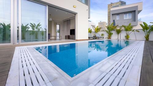an image of a swimming pool in a house at City Napa Seaview Villas - Villa 4 in Ayia Napa