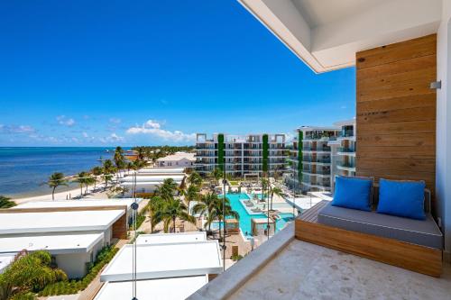 a view of the ocean from the balcony of a resort at Alaia Belize, Autograph Collection in San Pedro