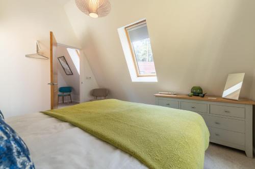 Postel nebo postele na pokoji v ubytování Reedcutter Lodge
