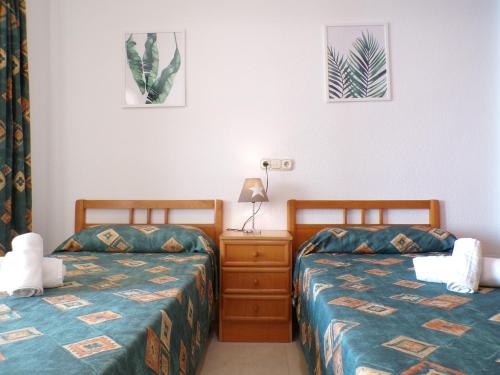 Posteľ alebo postele v izbe v ubytovaní Apartamento Torre Levante by Gestaltur