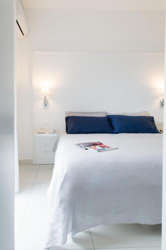 Ένα ή περισσότερα κρεβάτια σε δωμάτιο στο Hotel San Francesco
