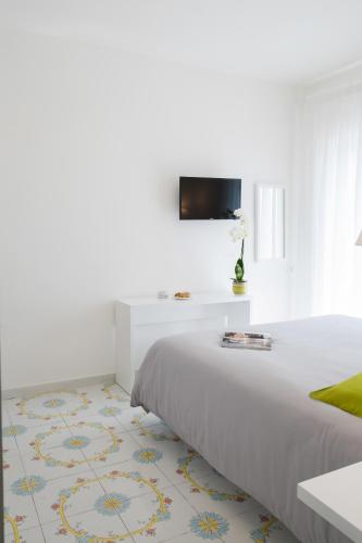 Ένα ή περισσότερα κρεβάτια σε δωμάτιο στο Hotel San Francesco