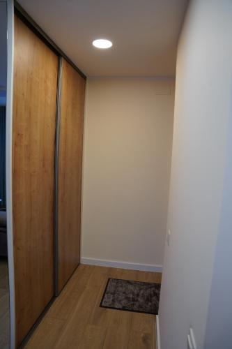 an empty room with a wall and a door at Studio Anna in Panevėžys