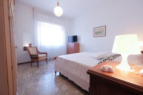 En eller flere senge i et værelse på Narciso Fronte Mare - Pineto Vacanza