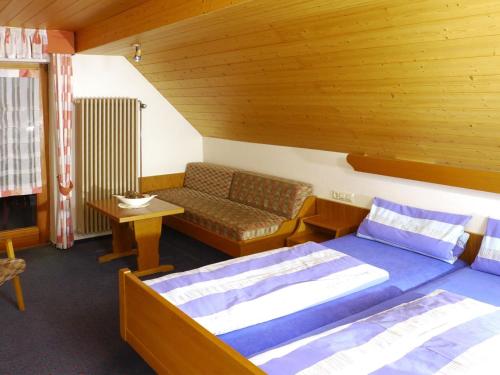 Krevet ili kreveti u jedinici u okviru objekta Gasthaus Pension Heidhof
