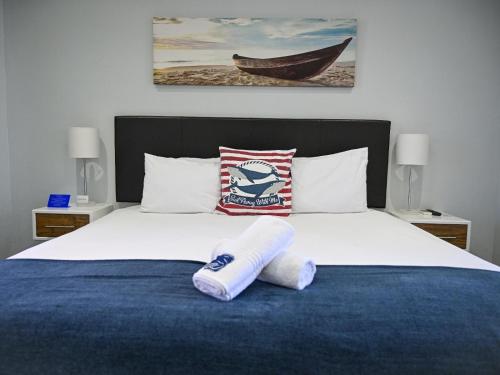 En eller flere senge i et værelse på Atlantic Oasis Guest House