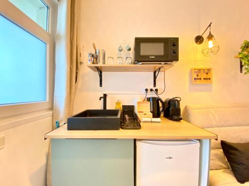 Mini-Studio Le Cormoran SCLS - Wifi, Clim, Centre Ville