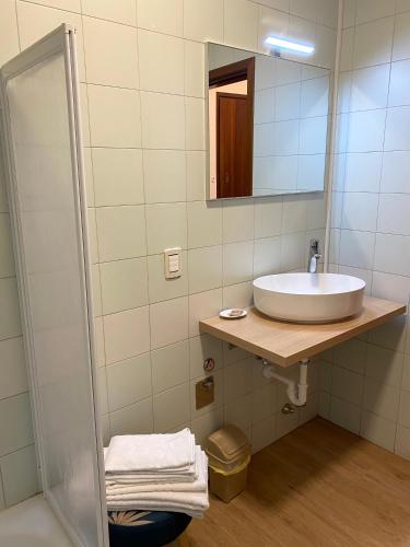 a bathroom with a sink and a mirror at Angel's Suite in Vicenza