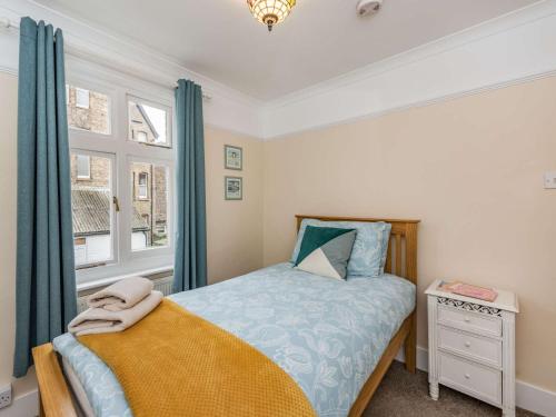 a bedroom with a bed and a window at 2 Bed in Eastbourne EHC06 in Eastbourne