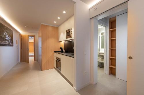 C&C Apartmentsにあるキッチンまたは簡易キッチン