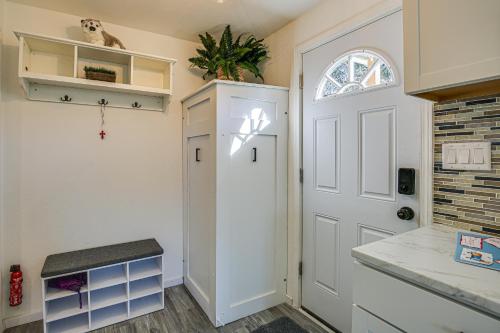 a kitchen with a white door and a counter at Cozy Springfield Studio about 7 Mi to Downtown Eugene in Springfield