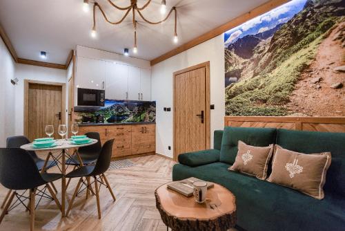 Khu vực ghế ngồi tại Apartamenty Pod Brzezinami