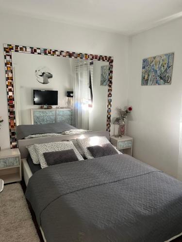 Posteľ alebo postele v izbe v ubytovaní Apartment Sweet Dreams-close to ZOO,Dinamo stadium and the city center