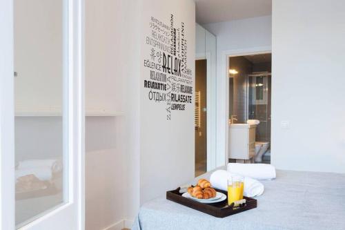 a tray of food on a table in a room at Perfectly located 4-bed 4-bath apartment in Barcelona 2-1 in Barcelona