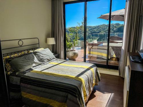 Ένα ή περισσότερα κρεβάτια σε δωμάτιο στο Casa Alpes