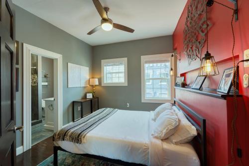 a bedroom with a bed and a ceiling fan at Movie Lover's Gem - Steps from Metro & the Capitol! in Washington, D.C.