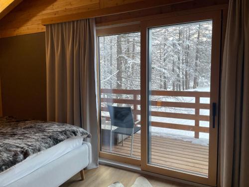 Postel nebo postele na pokoji v ubytování Chalet Tannegg