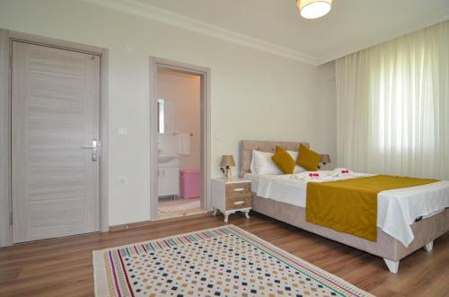 Postel nebo postele na pokoji v ubytování Villa Roza