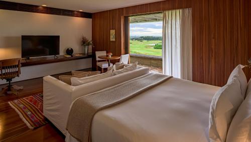 Postel nebo postele na pokoji v ubytování Hotel Fasano Punta del Este