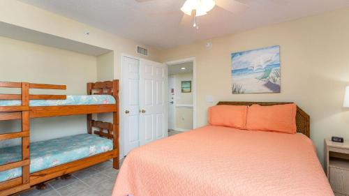 a bedroom with a bunk bed and a bunk bed at Ocean Bay Club 101 - Oceanfront - Ocean Drive Section in Myrtle Beach