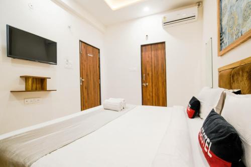 Postel nebo postele na pokoji v ubytování Aceotel Inn Flamingo