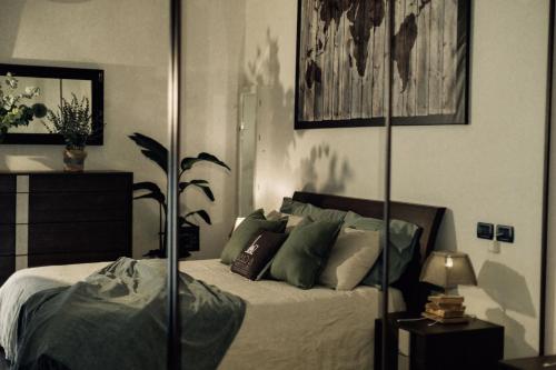 Łóżko lub łóżka w pokoju w obiekcie A Casa dello Steno - Unicità Rustica
