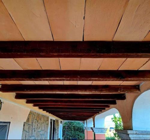 a close up of awning on top of a building at Gelsi Holiday Home La Maddalena in La Maddalena