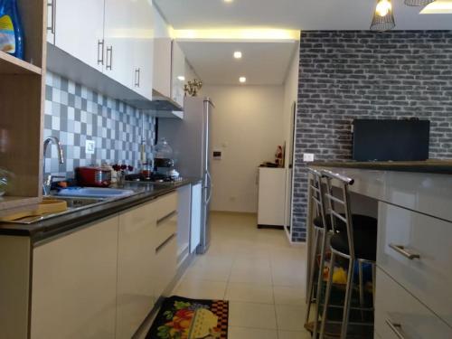 Dapur atau dapur kecil di Appartement moderne, vue mer