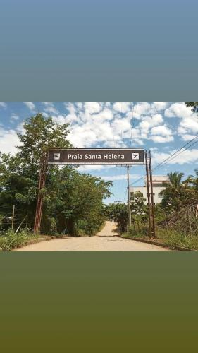 a sign that says pala santa helena on a road at Casa Temporada peterle Iriri in Iriri