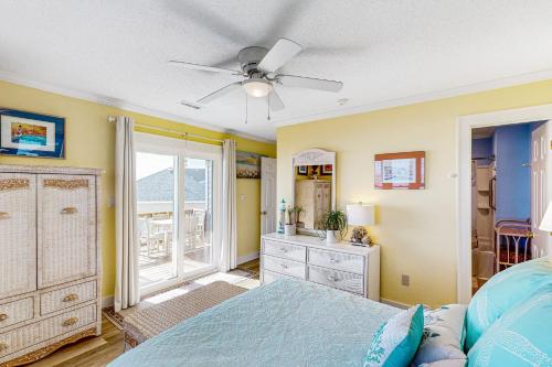 a bedroom with a bed and a ceiling fan at Tressa Terrace in Avon