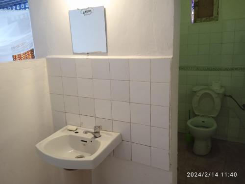 Koupelna v ubytování Campement Kunja